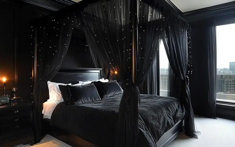 Black Four-Poster Bed with Sheer Drapes: